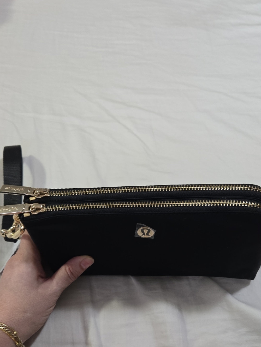lululemon black clutch with gold logo disc - Picture 8 of 11